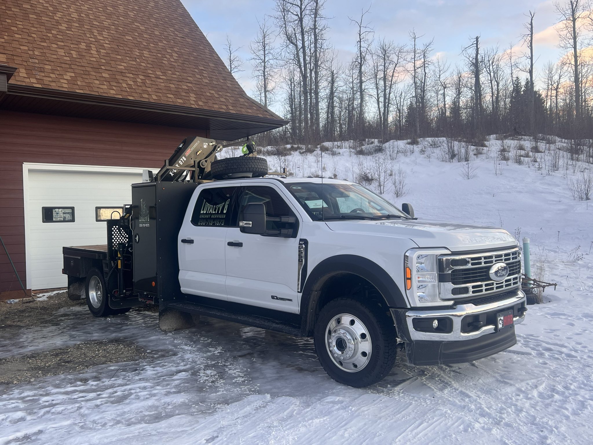 Loyalty6 crew truck parked at site